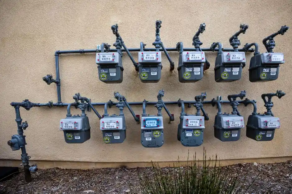 New gas meter and gas piping installation on the exterior of a New Braunfels, Texas home.
